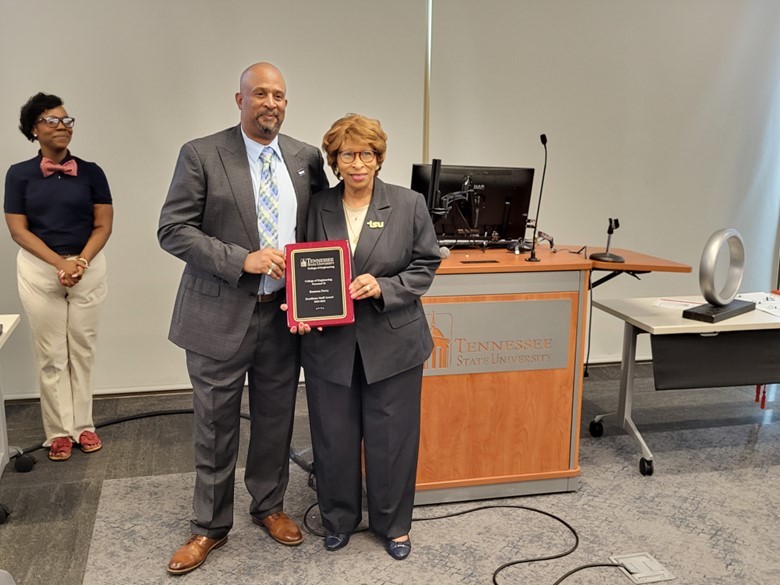 College of Engineering Staff Award (Ms. Perry (R)), Dr. McCurry (L)