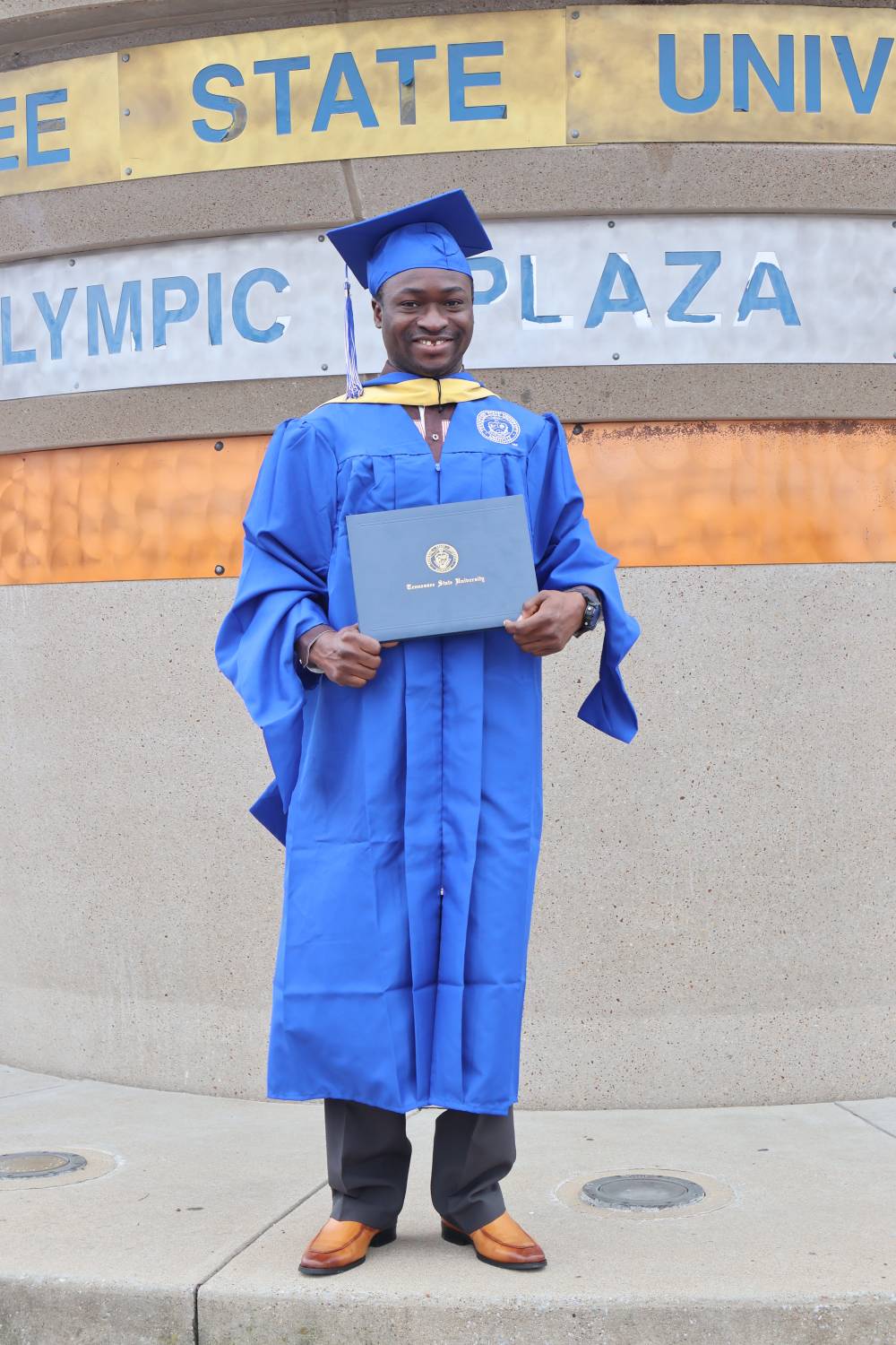 Mustapha Olawuni Graduation with Certificate