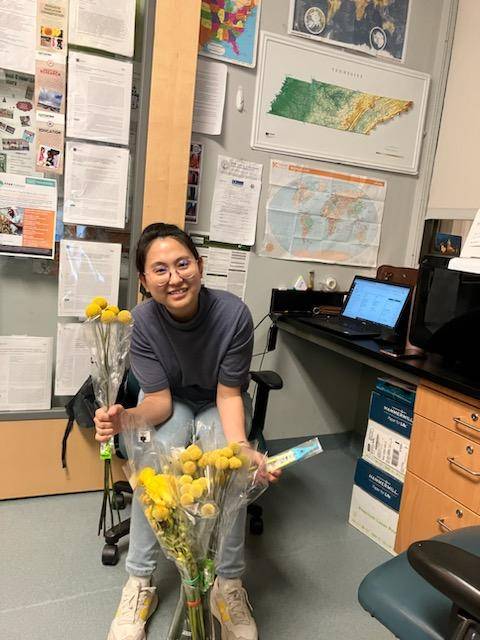 Dr. Li with flowers