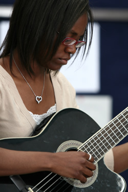 student playing guitar