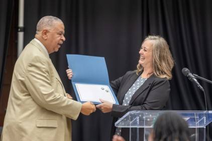 Mr. Vincent Sessoms receives the 2025 Pawprint of Purpose award